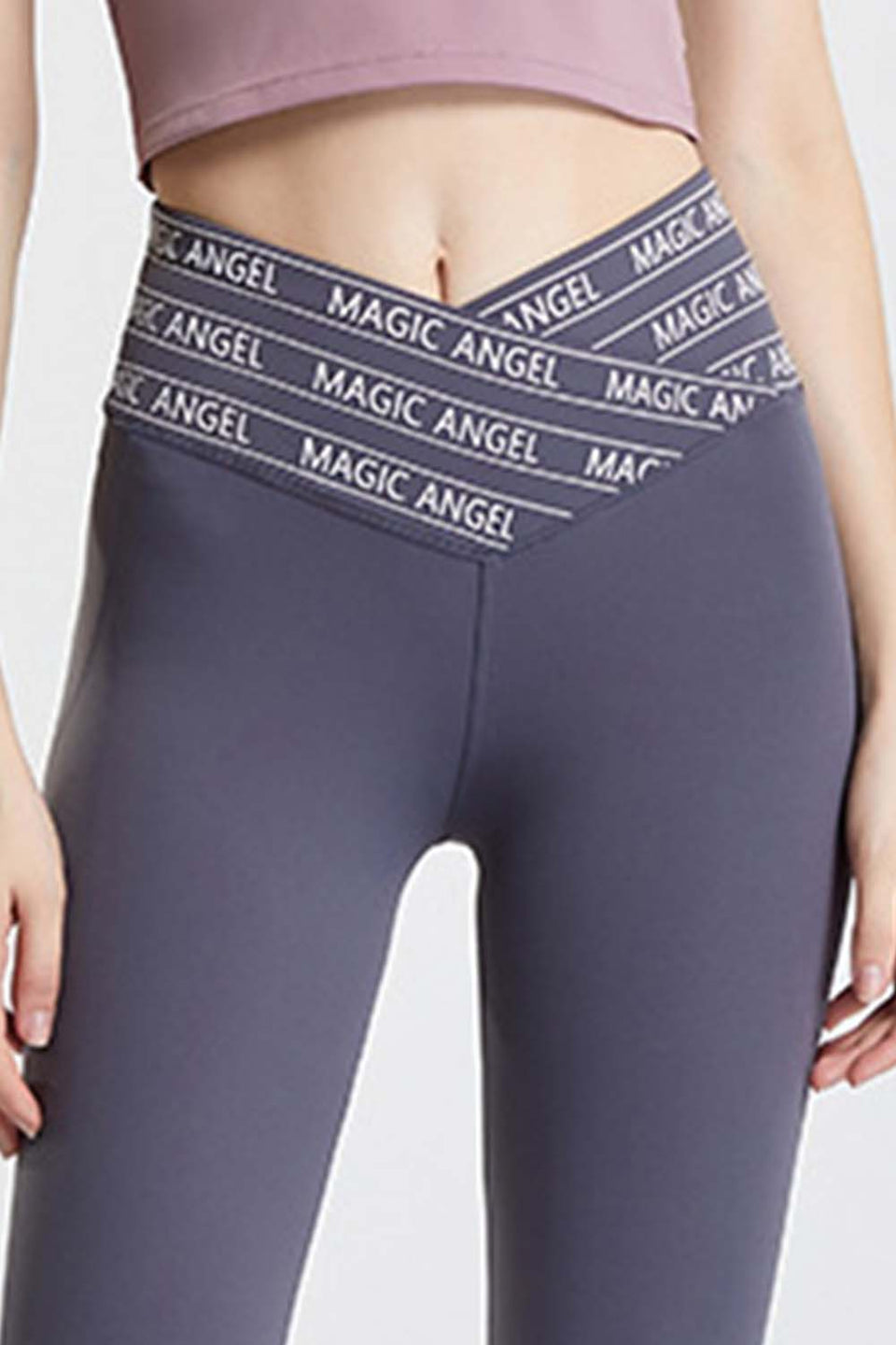 Close-up of high-waisted leggings with Magic Angel branded waistband in athletic shorts and leggings collection