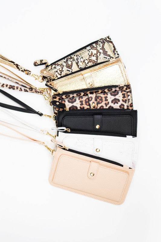 Babe Beachwear cruise wristlet wallet for women in various colors and patterns with wrist straps