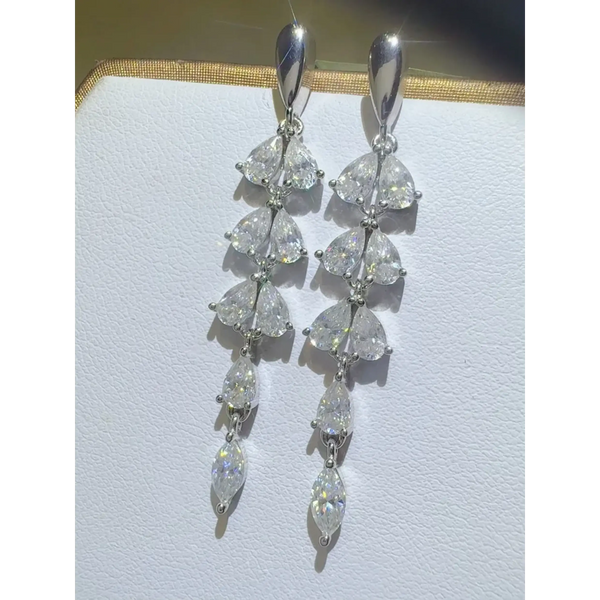 Elegant 6 Carat Drop Earrings featuring cascading pear-shaped clear gemstones in silver setting