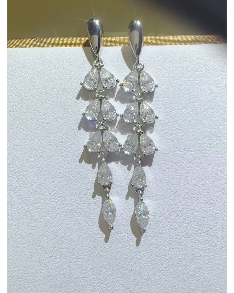 Elegant 6 Carat Drop Earrings with multiple pear-shaped clear stones in silver setting