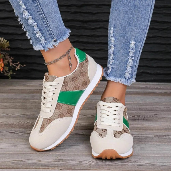 Trendsi affordable summer flat sneakers in beige with green accents and white sole worn with distressed jeans