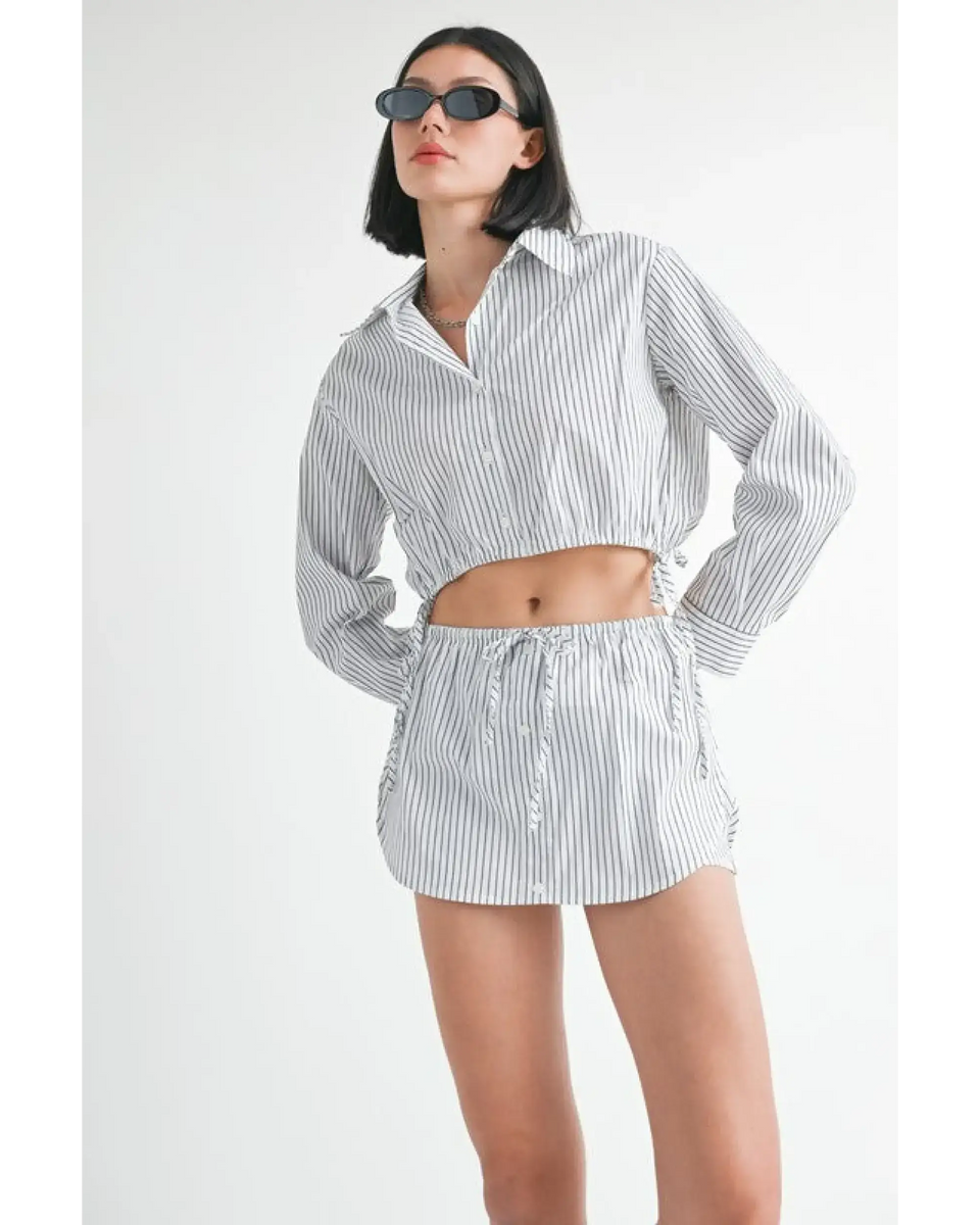 Emory Park blue and white cotton beach top with long sleeves and collar worn with matching shorts