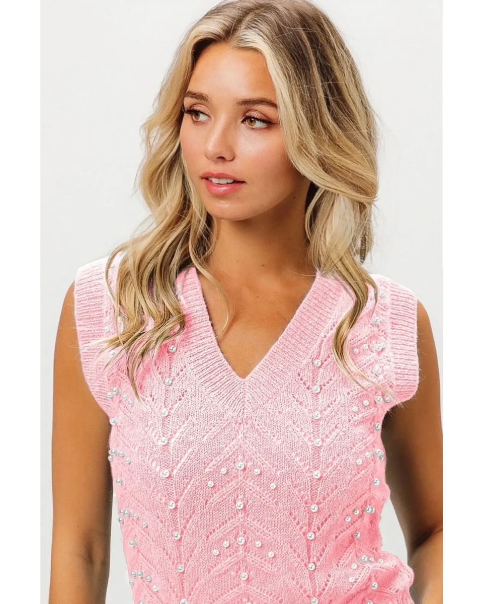Trendsi blush pink sleeveless blouse with V-neck and pearl embellishments on knitted fabric