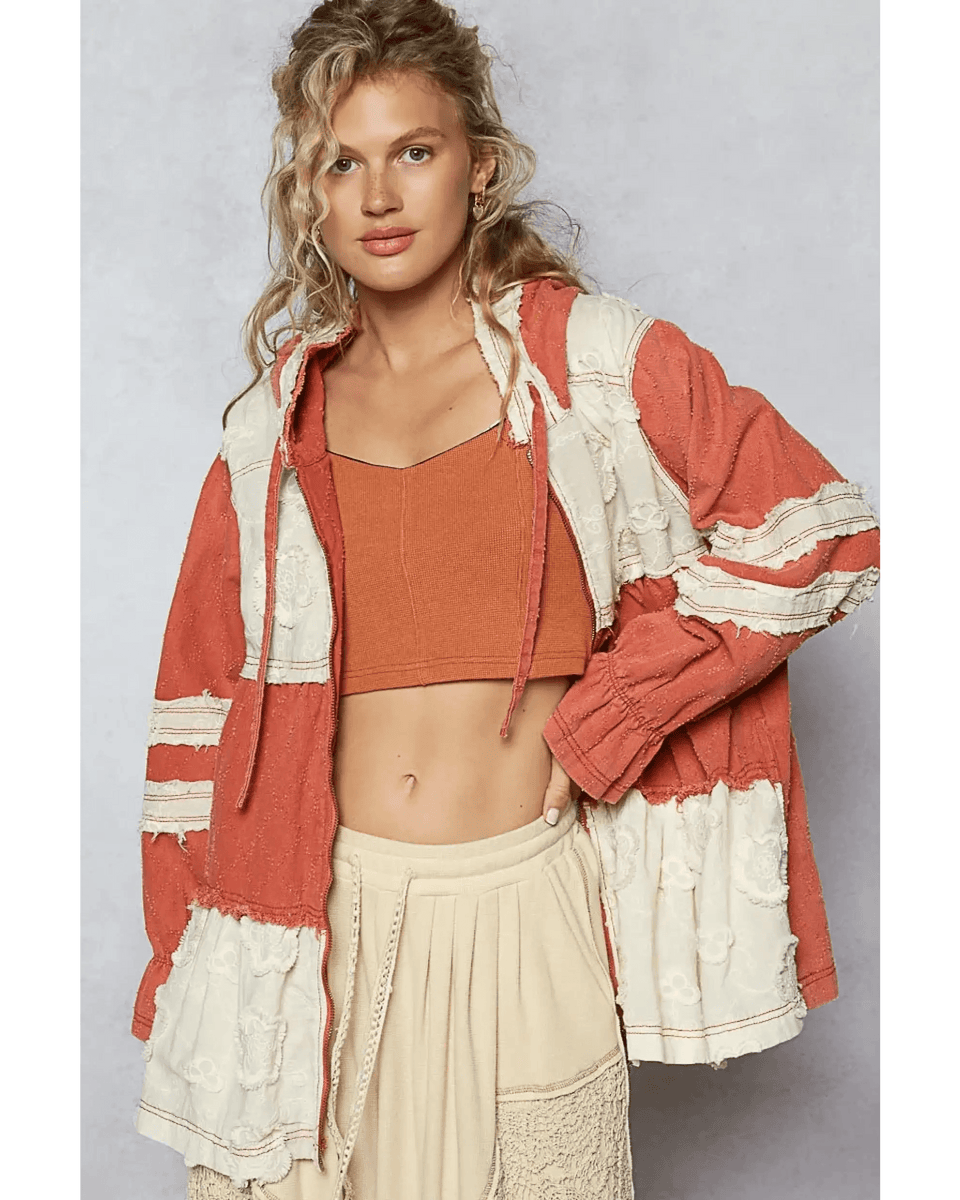 Trendsi boho chic beachwear jacket in rust and cream colors worn over a crop top and skirt