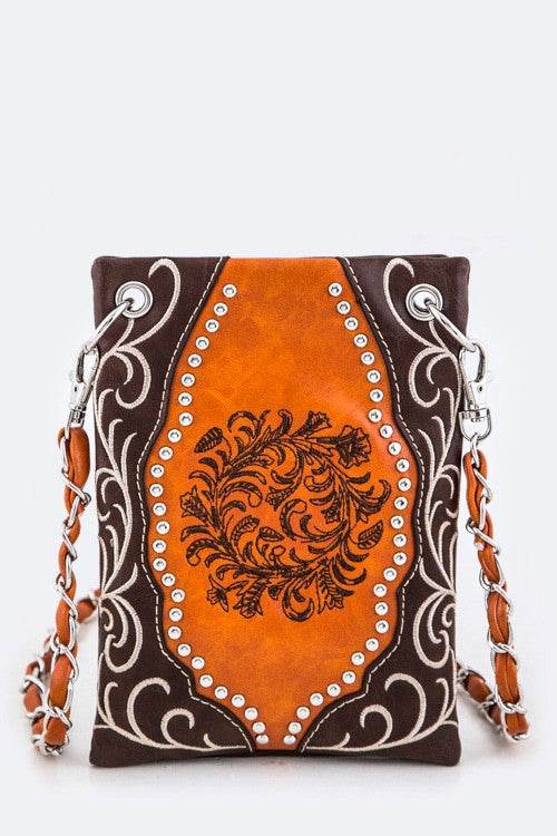 Babe Beachwear boho summer crossbody purse with brown and orange floral design and studded details
