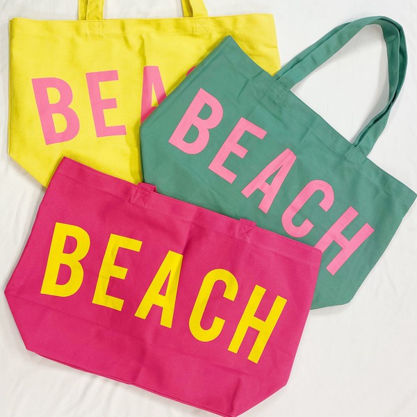 Colorful Canvas Beach Tote bags by Babe Beachwear with bold BEACH text in yellow and pink