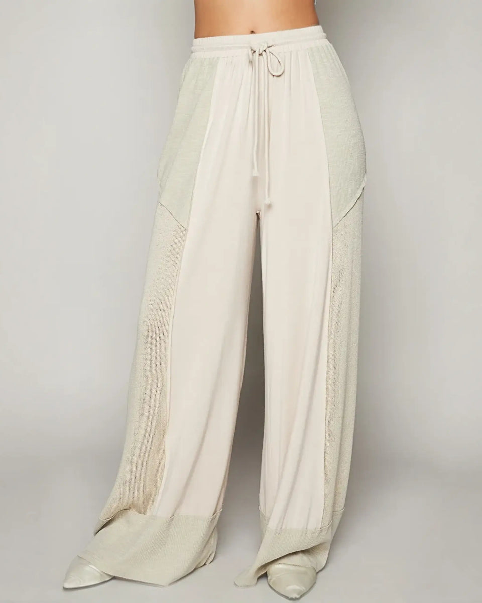 Beige cotton cream wide leg pants with drawstring waist for cool summer looks