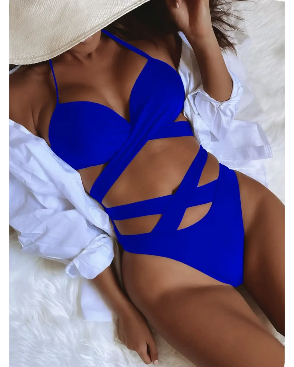 Beach Babes blue crisscross halter neck bikini with stylish cutouts on model reclining