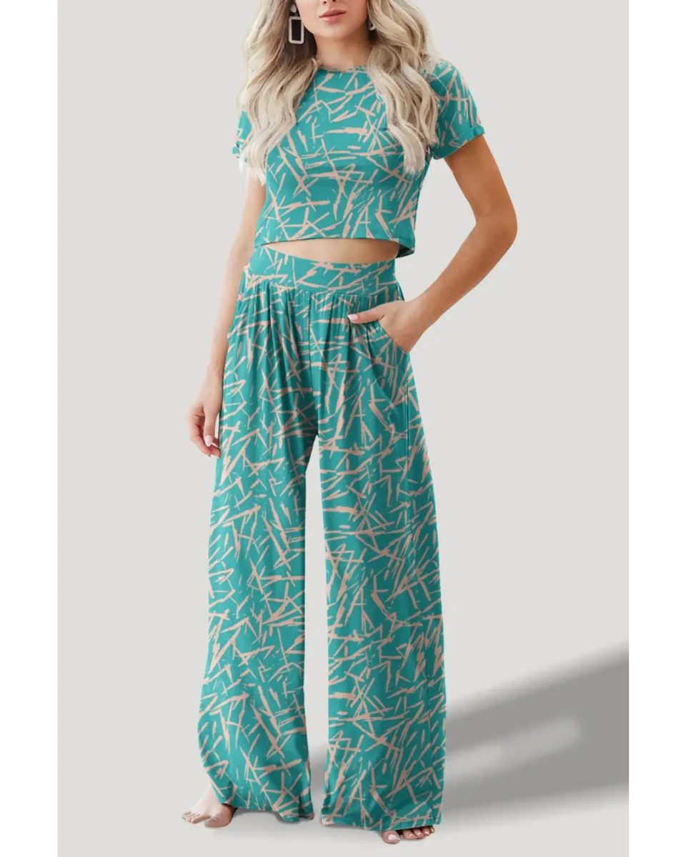 Turquoise crop top pants set with abstract print featuring short sleeve crop top and wide-leg pants