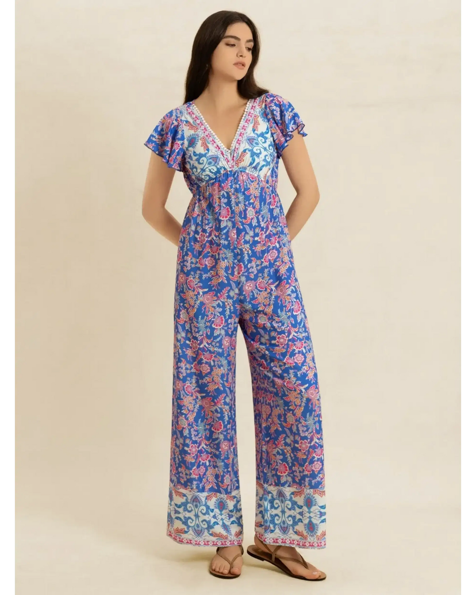 Trendsi floral wide leg jumpsuit for vacation in blue and pink with short sleeves and V-neck