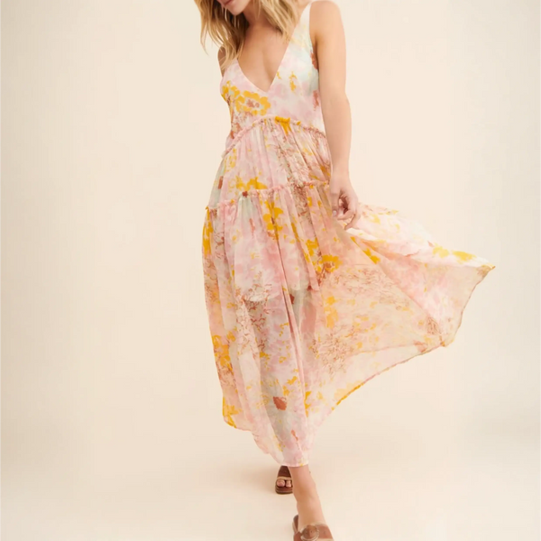 Trendsi flowy maxi dress for beach with pink and yellow floral pattern and V-neck design