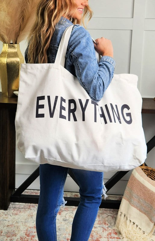 Babe Beachwear large oversize everything bag for travel in white canvas with black lettering