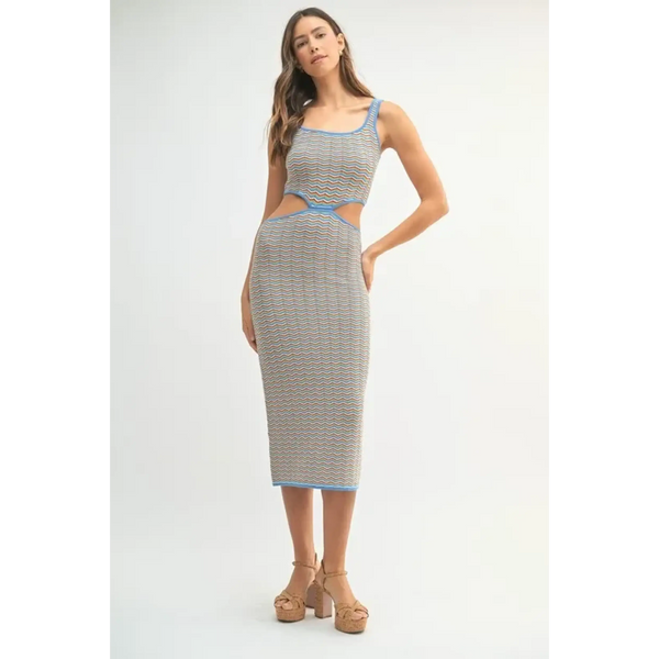 chevron knit bodycon midi dress with cutout detail and blue trim worn by model