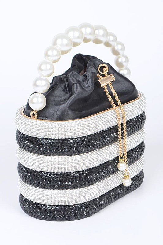 Sparkle Striped Bucket Bag with Gold Detail featuring black and white stripes and a pearl handle