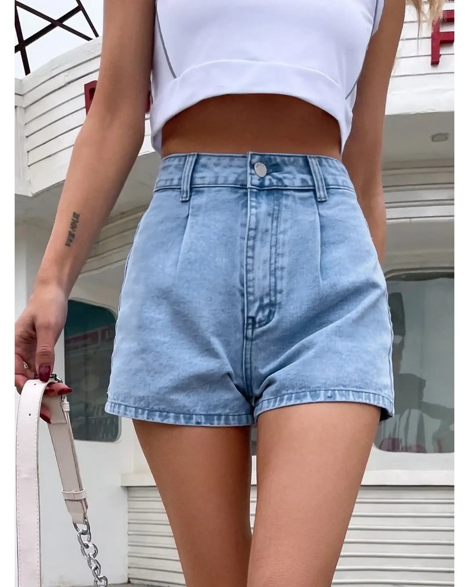 Trendsi stylish lightweight denim shorts worn with a white crop top outdoors