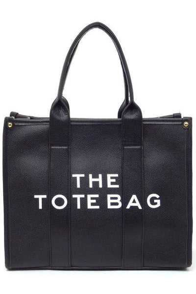 Black large beach tote bag for women with sturdy handles and spacious interior by Fashion World