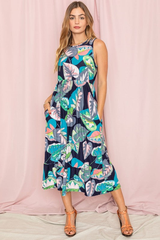 EG fashion tropical print sleeveless dress midi length with vibrant leaf pattern and pockets