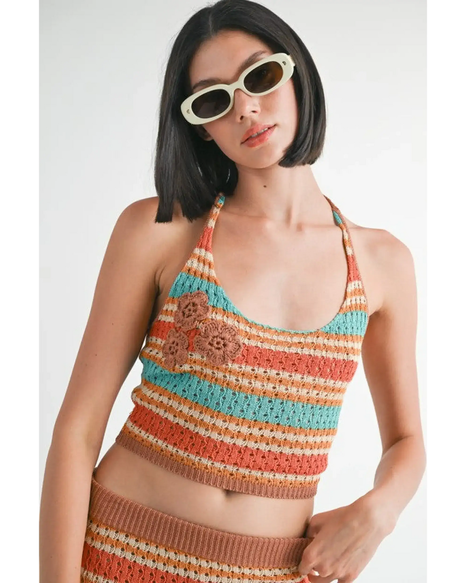 Emory Park crochet halter crop top in orange, teal, and beige stripes with floral accents