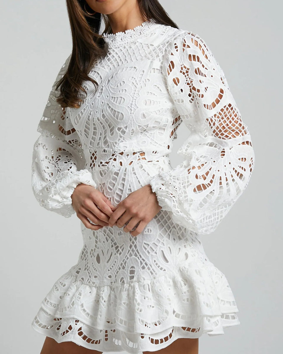 Babe Beachwear white lace mini cocktail dress with long puff sleeves and ruffled hem