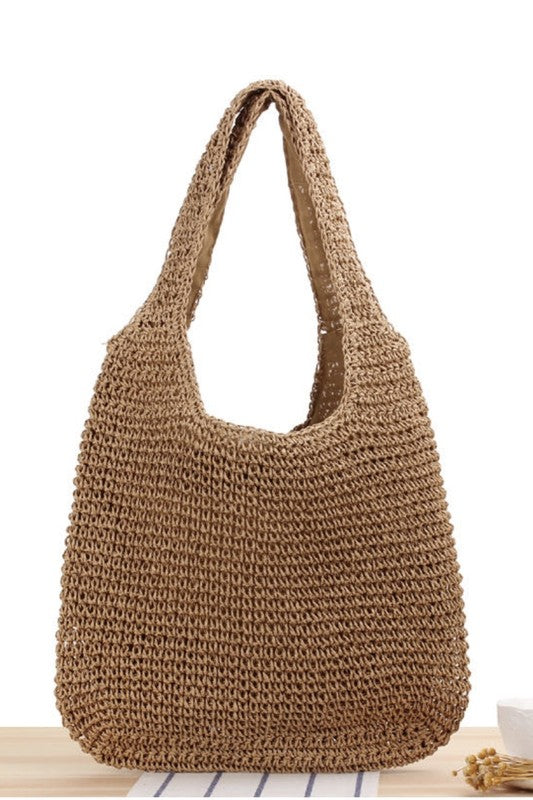 Babe Beachwaer woven boho summer bag in natural straw with wide handles and spacious design