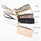Babe Beachwear cruise wristlet wallet for women in snake, rose gold, leopard, black, pink marble, and nude colors