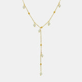 Delicate 18K gold plated pearl necklace with small pearls and gold bead accents in a Y-shaped design