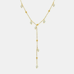 Delicate 18K gold plated pearl necklace with small pearls and gold bead accents in a Y-shaped design