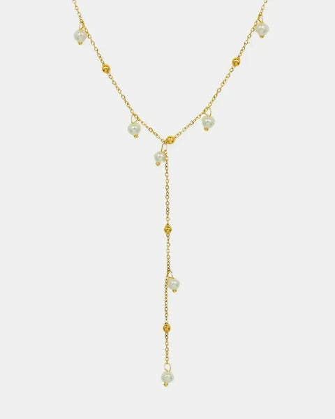 Delicate 18K gold plated pearl necklace with small pearls and gold bead accents in a Y-shaped design