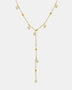 Delicate 18K gold plated pearl necklace with small pearls and gold bead accents in a Y-shaped design