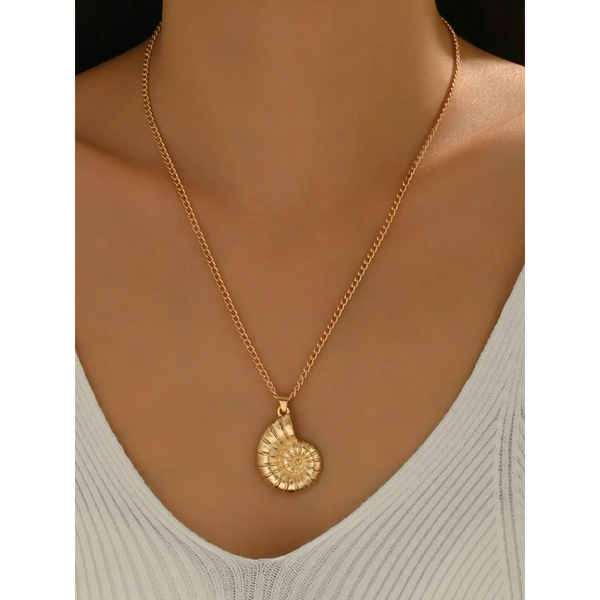 18K gold shell pendant necklace by Trendsi worn around neck with delicate chain and spiral shell charm
