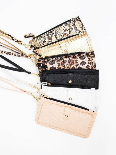 Babe Beachwear cruise wristlet wallet for women in various colors and patterns with wrist straps