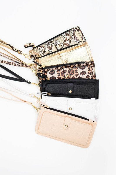 Babe Beachwear cruise wristlet wallet for women in various colors and patterns with wrist straps