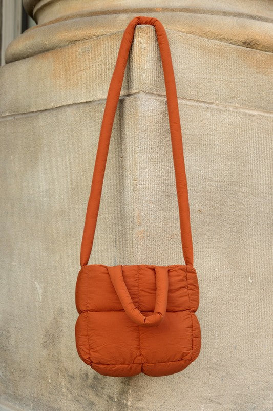 Babe Beachwear Jacie Puffer Mini Tote bag in burnt orange with padded quilting and long strap
