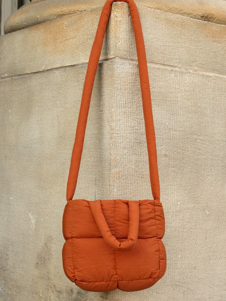 Babe Beachwear Jacie Puffer Mini Tote bag in burnt orange with padded quilting and long strap