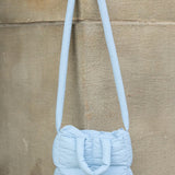 Babe Beachwear Jacie Puffer Mini Tote in light blue with long padded strap and quilted design