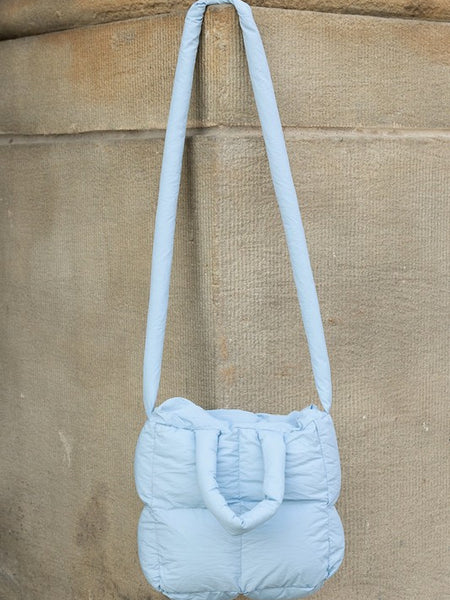 Babe Beachwear Jacie Puffer Mini Tote in light blue with long padded strap and quilted design
