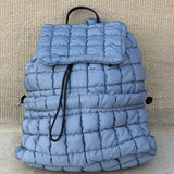 Babe Beachwear Puffer Backpack Lightweight in soft blue with quilted design and drawstring closure