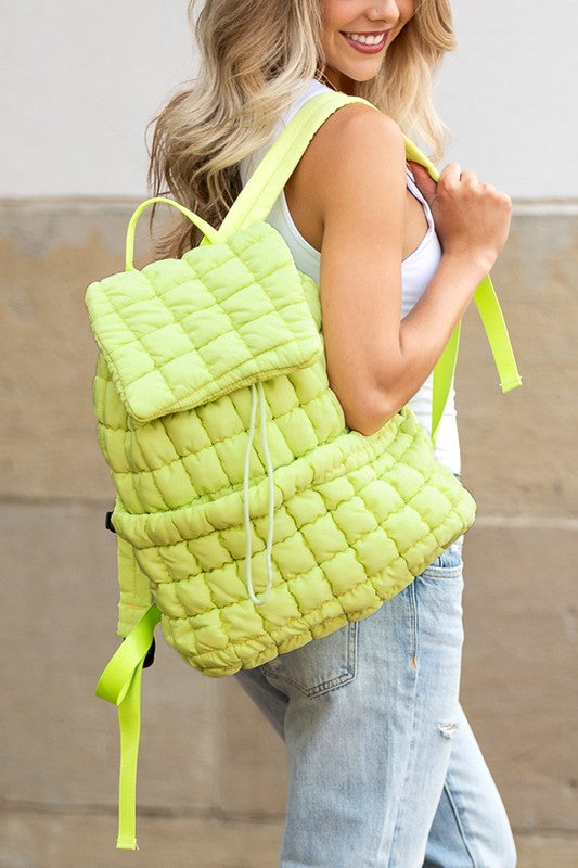Babe Beachwaer lime green Puffer Backpack Lightweight quilted design worn by woman