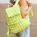 Babe Beachwaer lime green Puffer Backpack Lightweight quilted design worn by woman