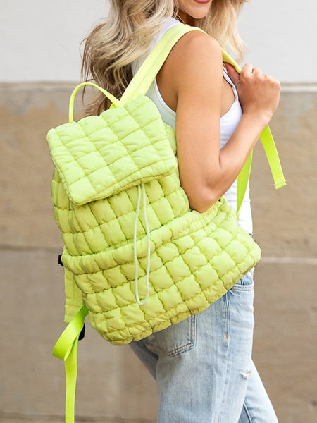 Babe Beachwaer lime green Puffer Backpack Lightweight quilted design worn by woman