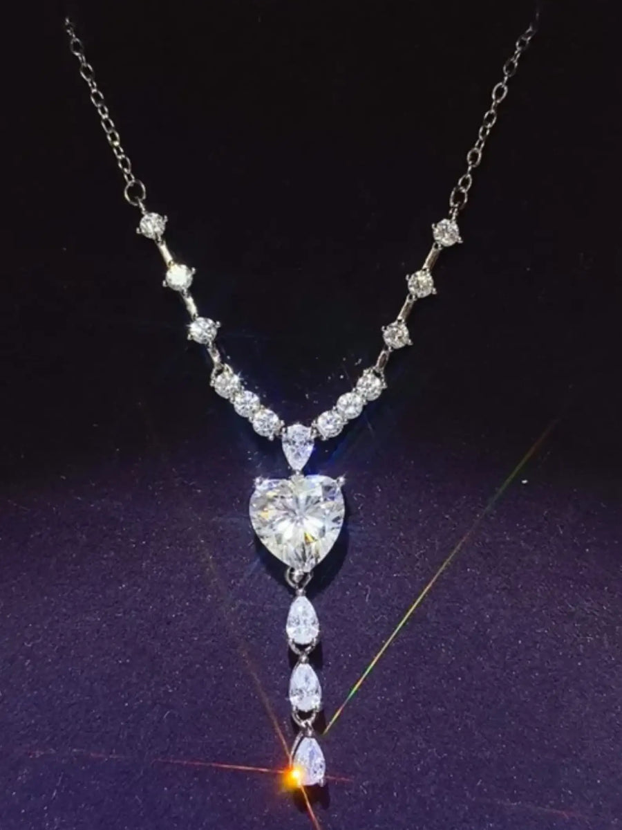 Brilliant 3 Carat Sterling Silver Necklace with Heart Pendant3 carat sterling silver necklace with heart-shaped and teardrop crystals on silver chain