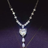 Brilliant 3 Carat Sterling Silver Necklace with Heart Pendant3 carat sterling silver necklace with heart-shaped and teardrop crystals on silver chain