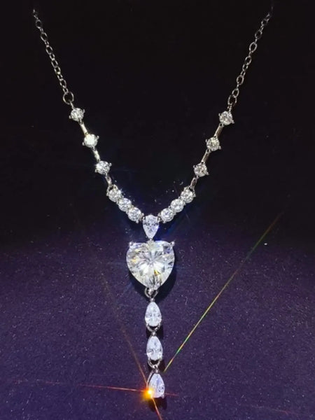 Brilliant 3 Carat Sterling Silver Necklace with Heart Pendant3 carat sterling silver necklace with heart-shaped and teardrop crystals on silver chain