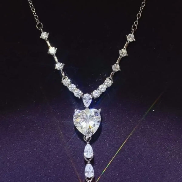 Brilliant 3 Carat Sterling Silver Necklace with Heart Pendant3 carat sterling silver necklace with heart-shaped and teardrop crystals on silver chain