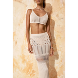 Beach Babes 3 piece crochet bikini cover up in white worn by model against textured wall