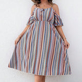 Trendsi striped cold shoulder midi dress with button front and flared skirt worn with a wide-brim hat