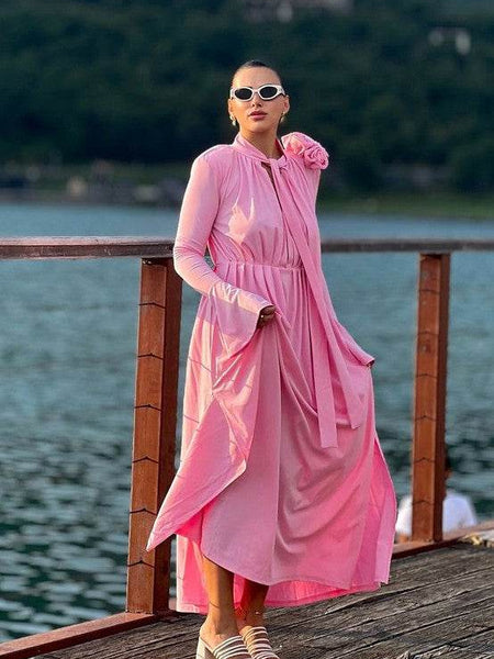 Babe Beachwear chic summer heeled sandals worn with pink flowy dress by the water
