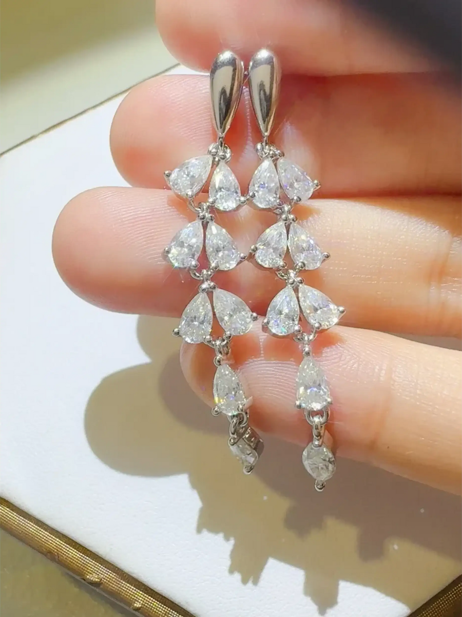 Elegant 6 Carat Drop Earrings featuring cascading teardrop-shaped clear stones in silver setting