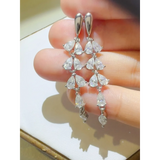 Elegant 6 Carat Drop Earrings featuring cascading teardrop-shaped clear stones in silver setting