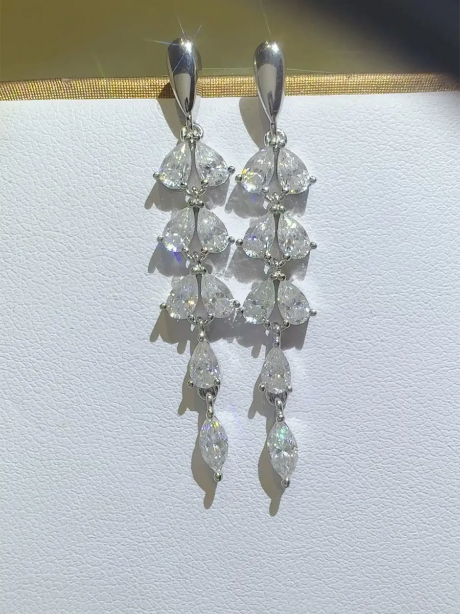 Elegant 6 Carat Drop Earrings with multiple pear-shaped clear stones in silver setting